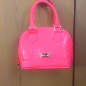 Betsey Johnson crossbody satchel in coral.